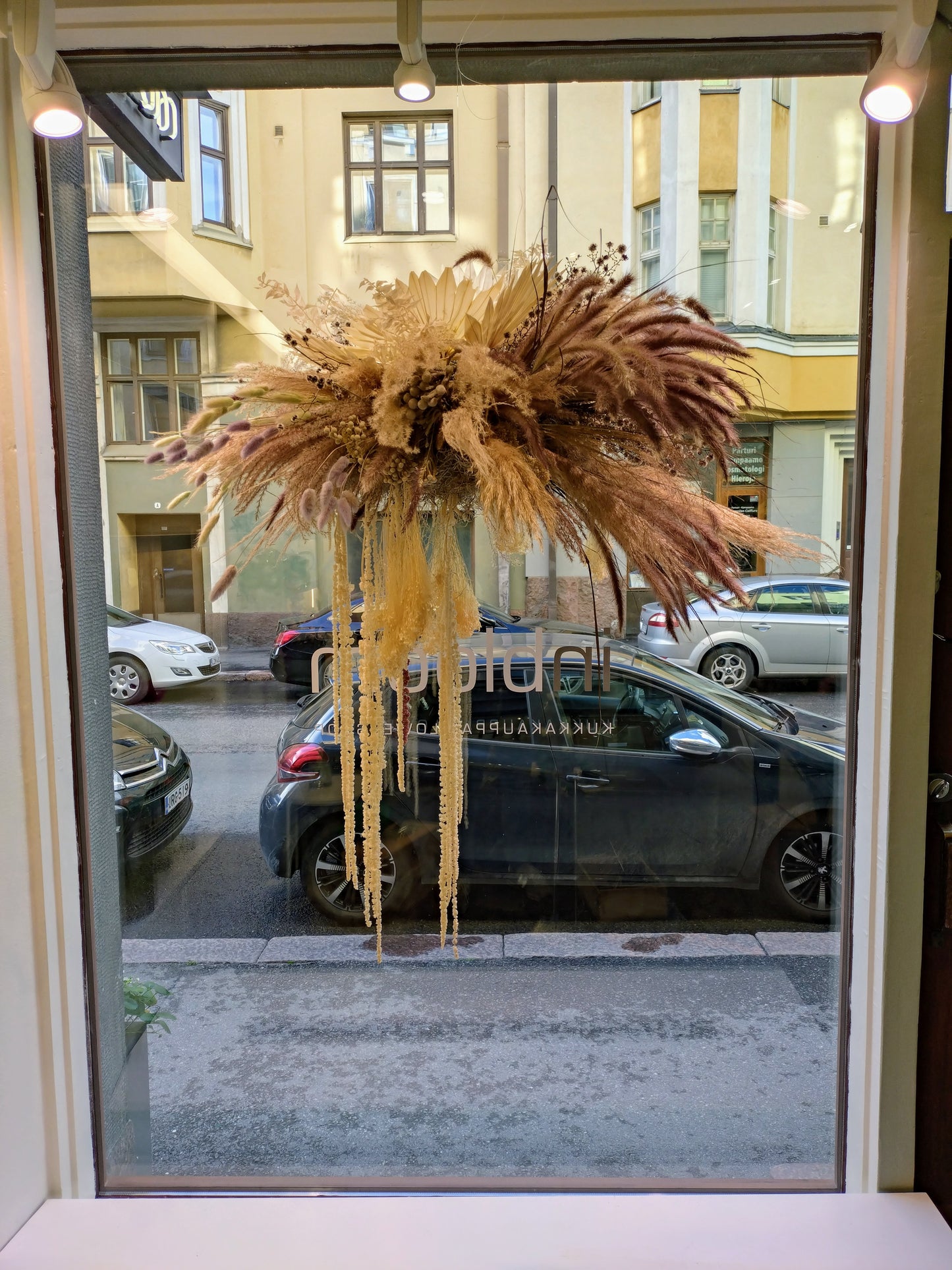 Dried Flower Cloud hanging in window at inbloom shop